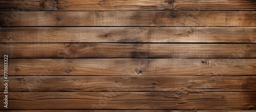 Detailed view of a wooden wall featuring a rich dark brown stain, creating a rustic and textured appearance