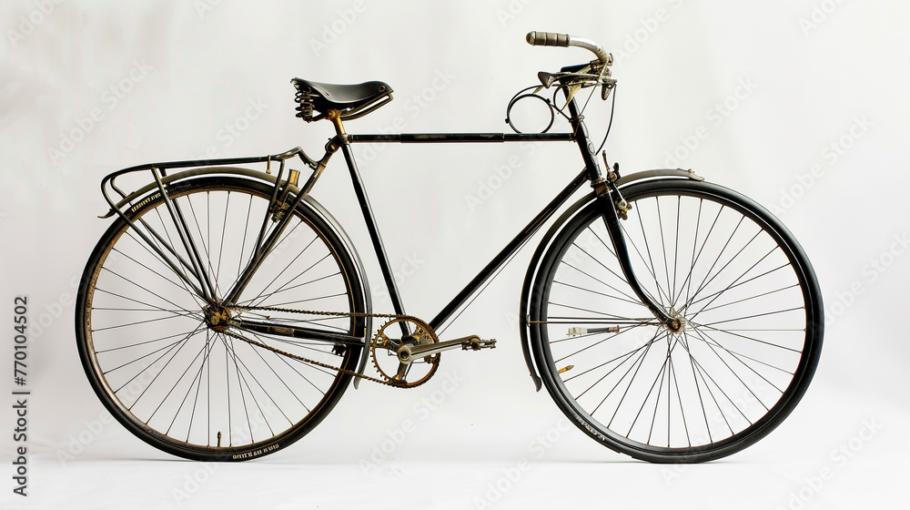 A silhouette of a classic bicycle, leaning slightly to one side. The white background contrasts with the bicycle's detailed contours, from the spokes in the wheels to the chain and the handlebars.