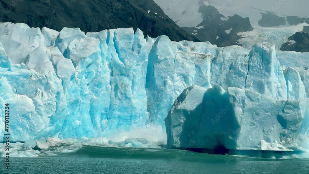 Huge piece of ice cracked and fell in the water at Perito Moreno glacier in Argentinian Patagonia