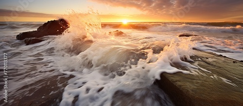 Beautiful seascape with waves and rocks at sunset. Long exposure.