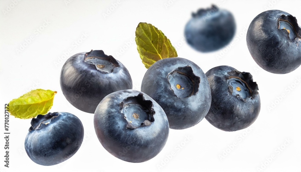 Blueberries slices flying isolated on a white background. Blueberries slices flying isolated on a white background.