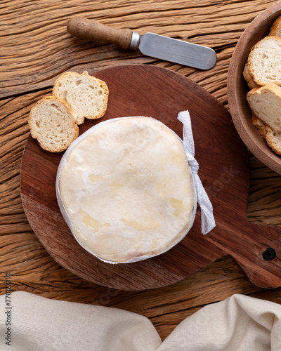 Jordao cheese, brazilian country cream cheese with toasts over wooden table photo