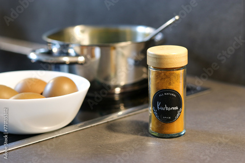 Obraz na płótnie Coloring easter eggs with natural herb curcuma at home