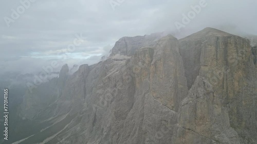 Drone shot in cloud mountain Dolomites