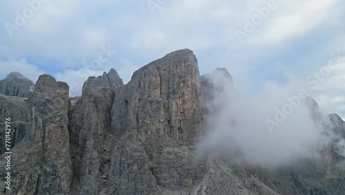 Drone shot in cloud mountain Dolomites