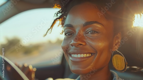 A Smiling American African woman driving car