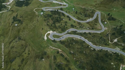 Drone shot over mountain road Dolomites