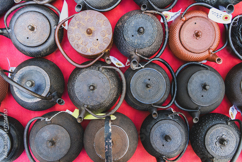 A view of teapots for sale at a vintage market