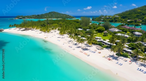 Aerial view of beautiful tropical beach with white sand, turquoise water and palm trees. © Iman