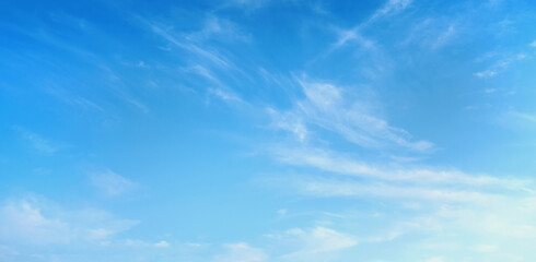 clear blue sky with a few clouds