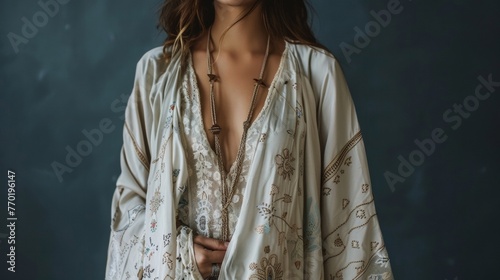 Blank mockup of a soft and flowy kimono perfect for showcasing a bohoinspired design or intricate embroidery. photo