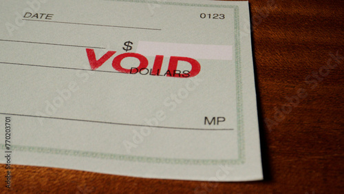5 photo of blank green generic check on table with void stamp