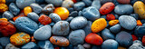  Illustration of small sea stone pebble background,  
Colorful Pebbles Background with Blur
