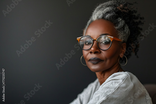 portrait of confident adult 50 years old female psychologist looking at camera