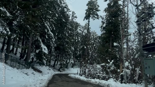 Winter beauty snow in pahalgm, Kashmir: A Snowy Adventure in the Himalayan Region Anantnag - snow on roads, Snowboarding, and Majestic View photo