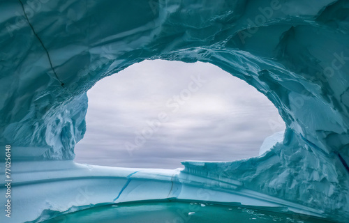 Ice cave. iceberg in the sea