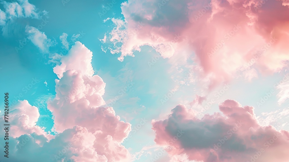 Beautiful background image of a romantic blue sky with soft fluffy pink clouds - obrazy, fototapety, plakaty 