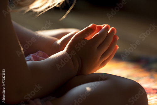 Close up kids hands praying photo