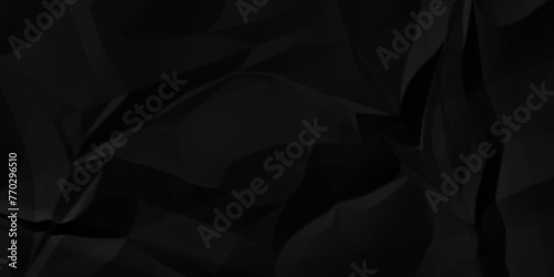 Dark black wrinkly backdrop paper background. panorama grunge wrinkly paper texture background, crumpled pattern texture. black paper crumpled texture. black fabric crushed textured crumpled.