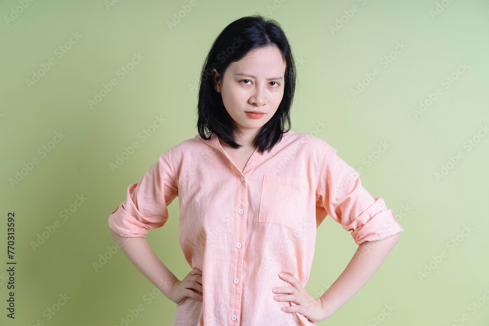 Obraz premium Photo of young Asian woman on background