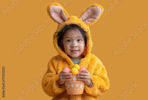 Girl in Easter costume with easter eggs