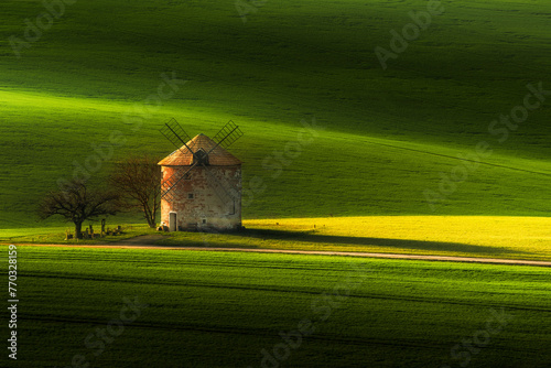 Kunkovice windmill in the Czech Republic. Historical windmill in the fairytale landscape of South Moravia.  photo