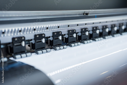Close-up of large format printer heads in action © Naypong Studio