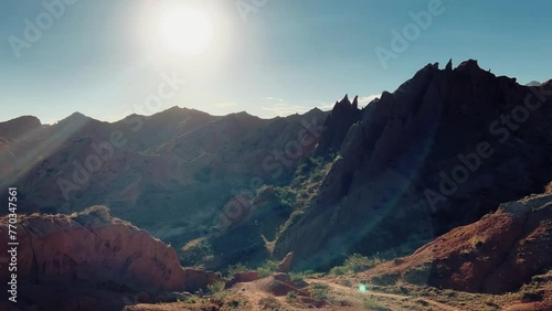 A fabulous canyon in Central Asia. Scenic view of a beautiful textured multi-layered canyon. Mountain ranges in a fabulous canyon at sunset near Lake Issyk-Kul in Karakol. 4K