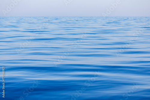 The calm waters of the Mediterranean Sea, in the early morning photo