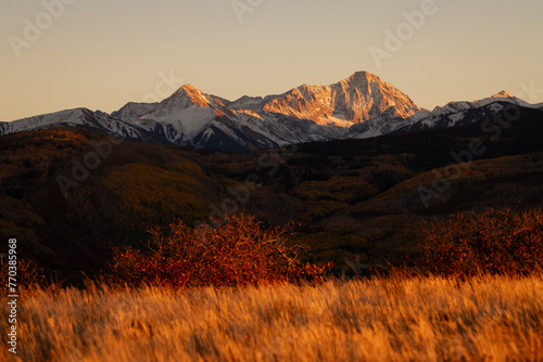 Scenic view of Capitol Peak and landscape against sky at sunrise