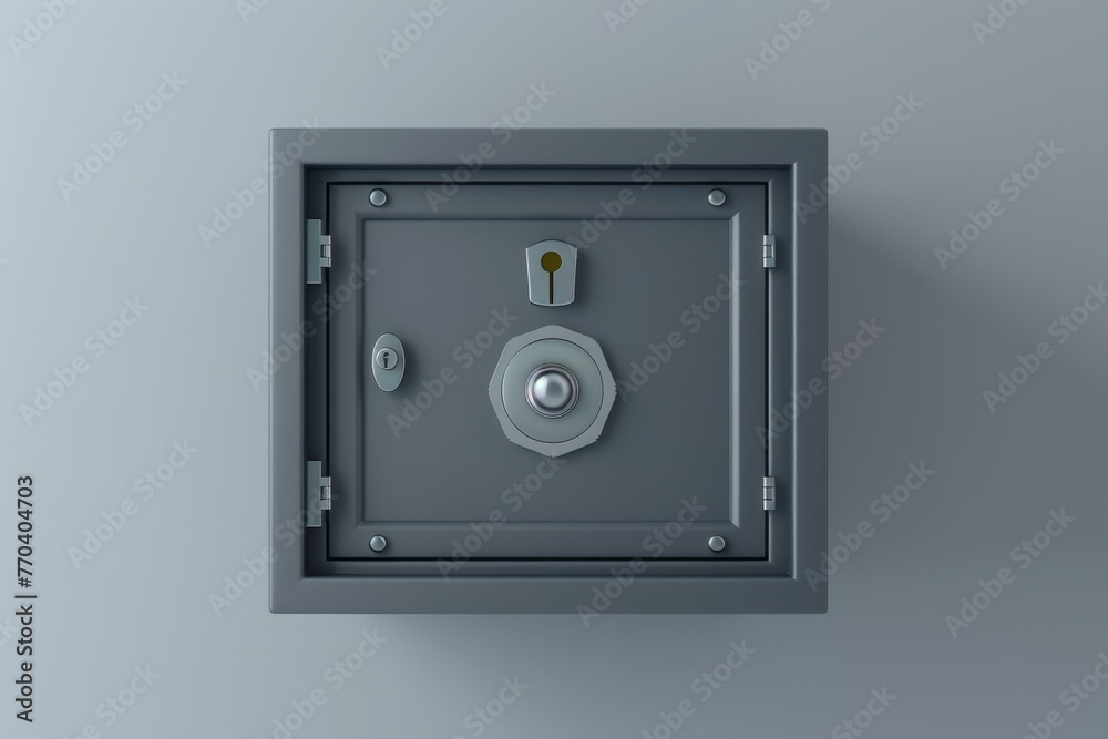 A gold colored safe with a keyhole and a silver plate on top A gold colored safe with a keyhole and a silver plate on top