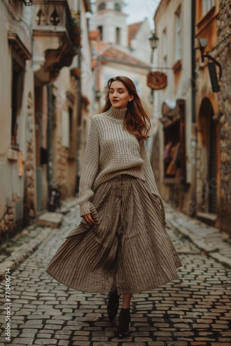 Fashionable Woman in Boat Neck Sweater and Woolen Skirt: European Travel Style © Cyprien Fonseca
