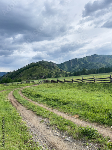 Rural road in the mountains. Mountain Altai.