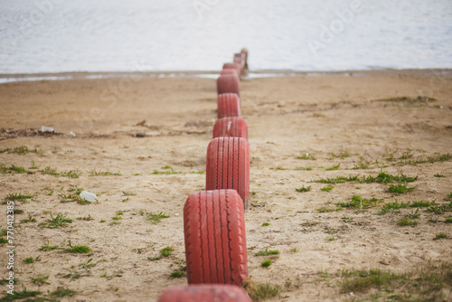 red tires on the beach