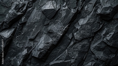 Black or dark gray rough grainy stone texture background wall to display your products.