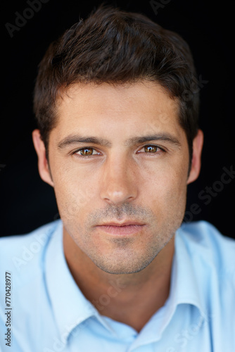 Closeup, serious and portrait of businessman in studio with pride, confidence or professional job. Male person, corporate and career with face for occupation, startup or employee on black background