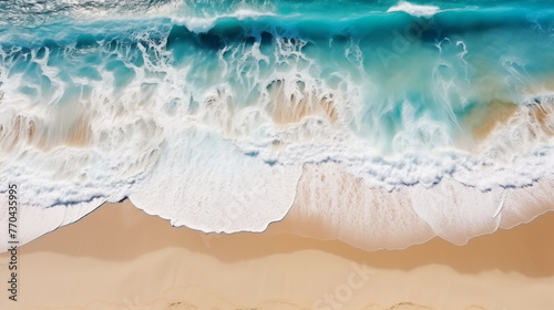 Aerial top view of beautiful tropical white sand beach. Summer seascape beautiful waves, blue sea water in sunny day. Top view from drone.