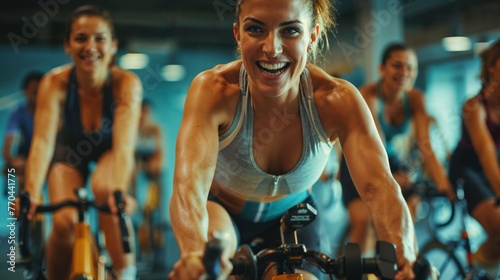 indoor cycling, spin class, fitness, energetic, women, workout, exercise bikes, active lifestyle, cardio workout, health, motivation, gym, training, smiling, enjoyment, physical fitness photo