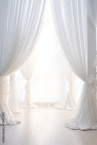 Large window with billowing white curtains