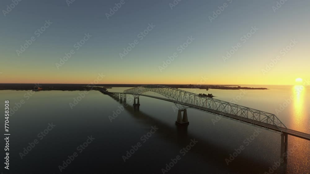 Aerial drone side view at sunset of the Francis Scott Key Bridge - Baltimore and Dundalk in Maryland. United States Aerial drone side view at sunset of the Francis Scott Key Bridge - Baltimore and Dundalk in Maryland. United States