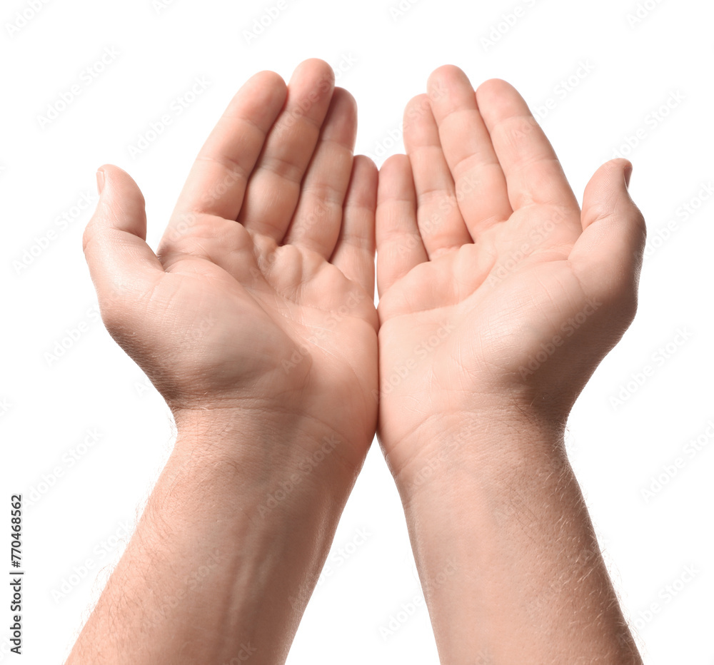 Religion. Man with open palms praying on white background, closeup Religion. Man with open palms praying on white background, closeup