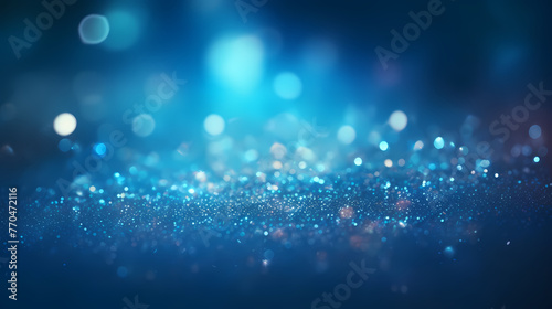 Blue abstract glitter bokeh background © jiejie