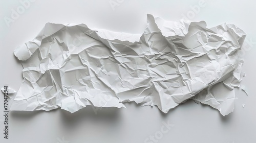 Crumpled and torn folded paper towel isolated on white