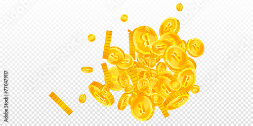 Thai baht coins falling. Gold scattered THB
