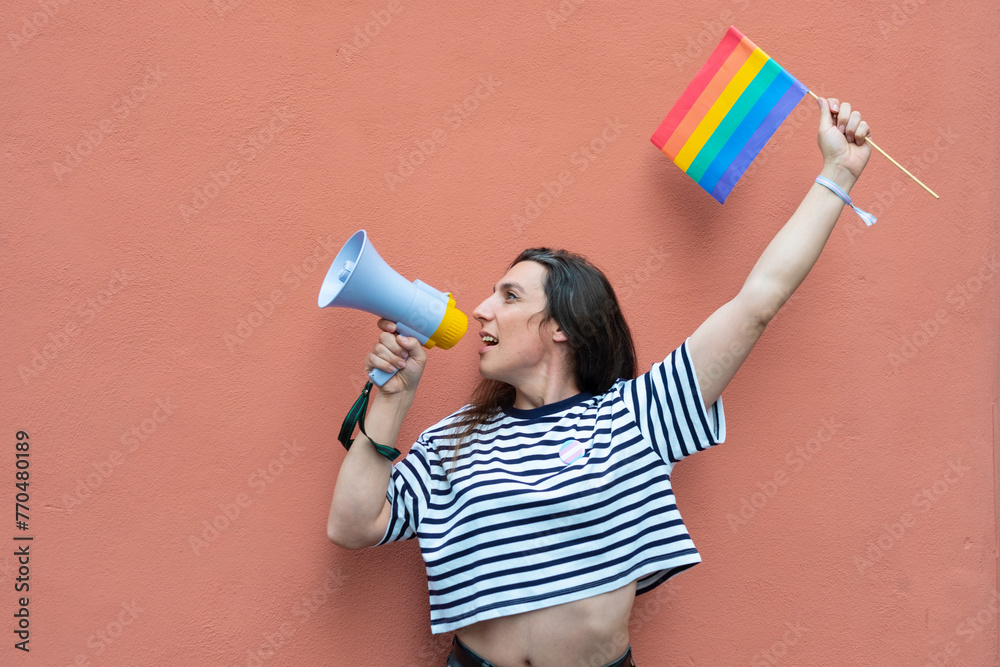 transgender LGBT hispanic celebrating rainbow flag and megaphone ...