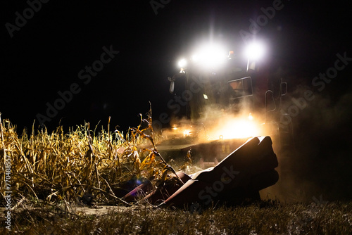 The combine harvests  at night © Dusan Kostic