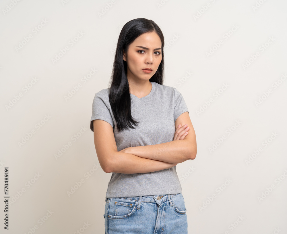 Upset confused bad emotional and thinking asian woman. Unhappy stressed female. Young latin lady standing feeling depressed dramatic scene looking at camera on isolated background. Upset confused bad emotional and thinking asian woman. Unhappy stressed female. Young latin lady standing feeling depressed dramatic scene looking at camera on isolated background.
