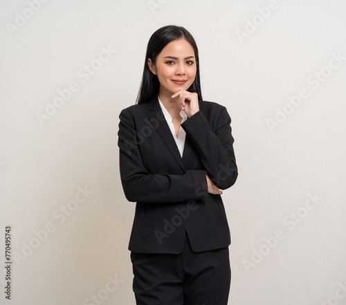 Beautiful young asian business woman in suit. Charming female lady standing pose thinking on isolated white blank background. Asian female office worker have idea with copy space for text advertise