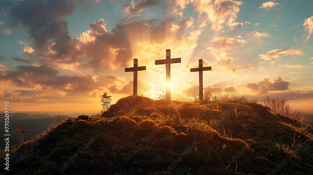 Three crosses stand a hill at sunset - obrazy, fototapety, plakaty 