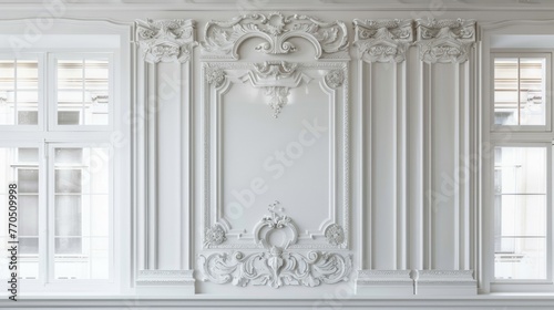 Elegant white stucco molding on wall with classic architecture details.